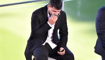 Barcelona's Argentinian forward Kun Aguero reacts as he addresses a press conference to announce his retirement from football, at the Camp Nou stadium in Barcelona, on December 15, 2021. (Photo by Pau BARRENA / AFP) (Photo by PAU BARRENA/AFP via Getty Images)