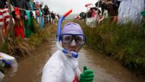 LLANWRTYD WELLS, WALES - AUGUST 28: A competitor prepares to snorkle during the World Bog Snorkelling Championships on August 28, 2011 in Llanwrtyd Wells, Wales. In 2012, following the Olympic Games, Llanwrtyd Wells will host the inaugural World Alternative Games. (Photo by Harry Engels/Getty Images)	