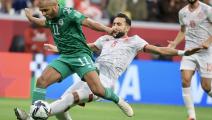 AL KHOR, QATAR - DECEMBER 18: Gaylen es-Seglali (R) of Tunisia in action against Yacine Brahimi (11) of Algeria during the FIFA Arab Cup final match between Tunisia and Algeria at Al Bayt stadium in Al Khor, Qatar on December 18, 2021 (Photo by Mohammed Dabbous/Anadolu Agency via Getty Images)	